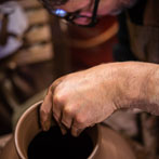 Doug Fitch and Hannah McAndrew making a jug for me